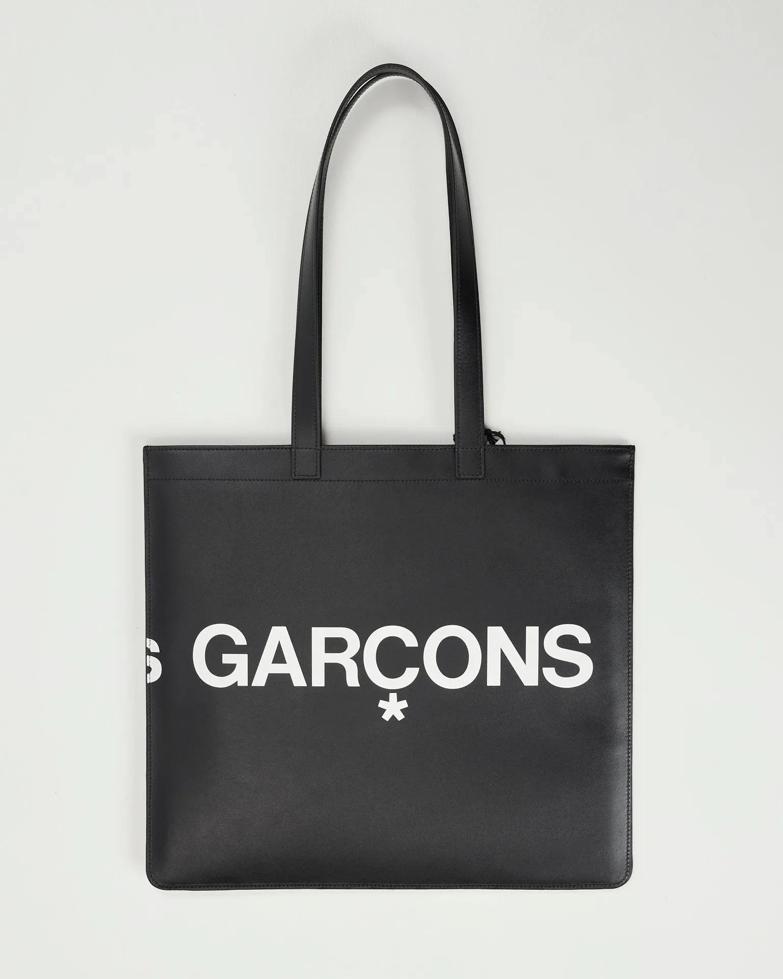 Comme des Garons borsa in pelle logata