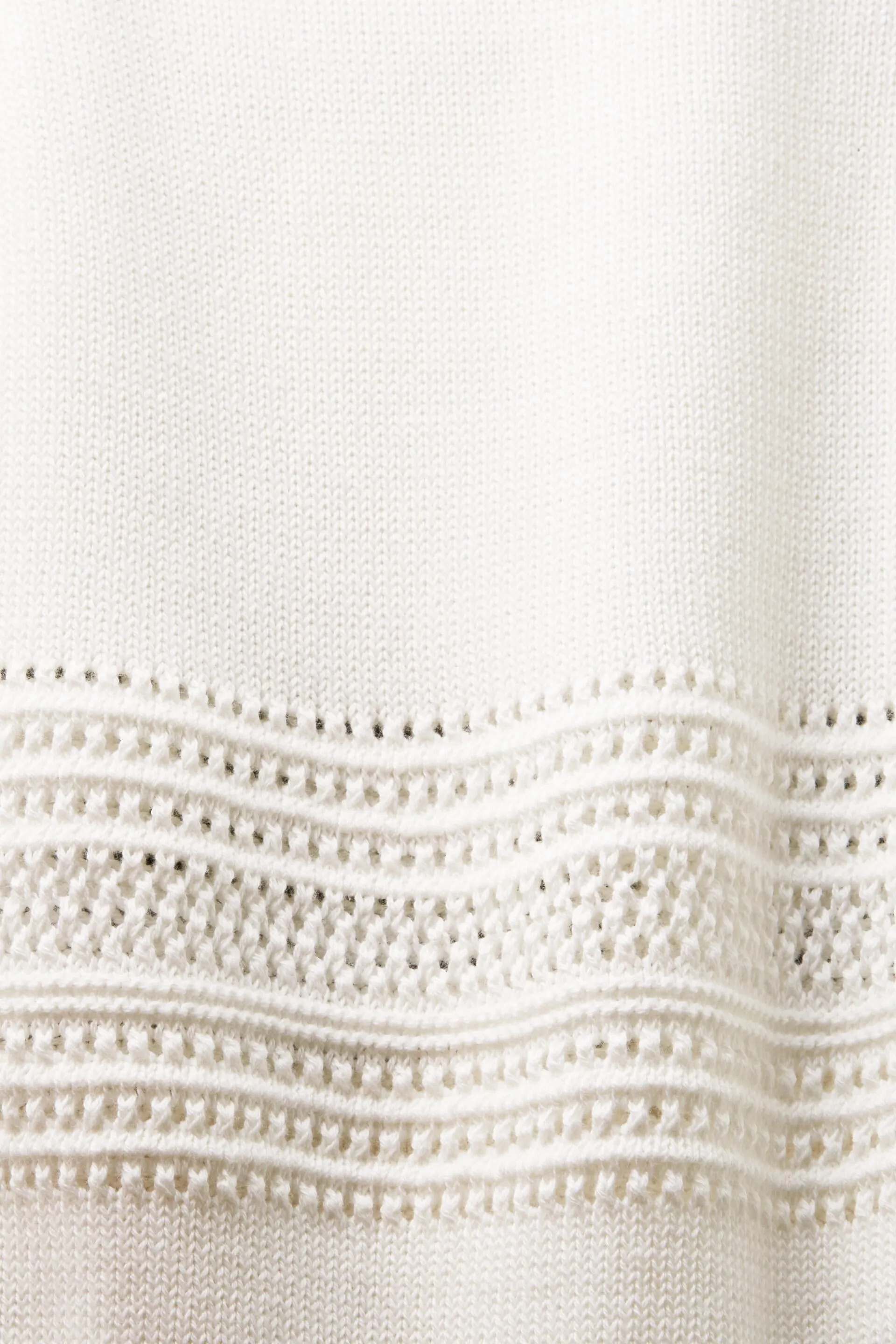 Pullover in mesh senza maniche