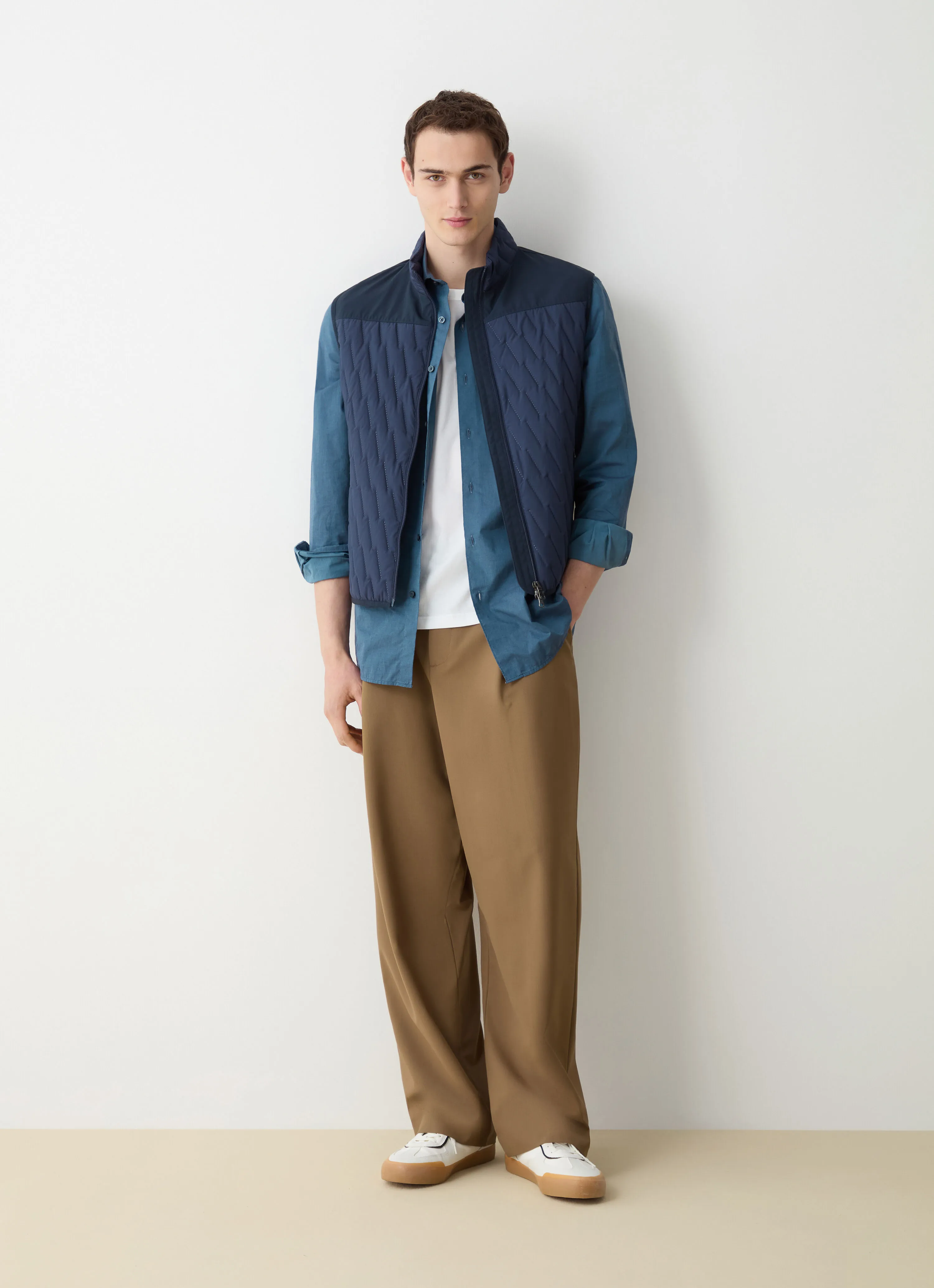 Quilted gilet with softshell inserts