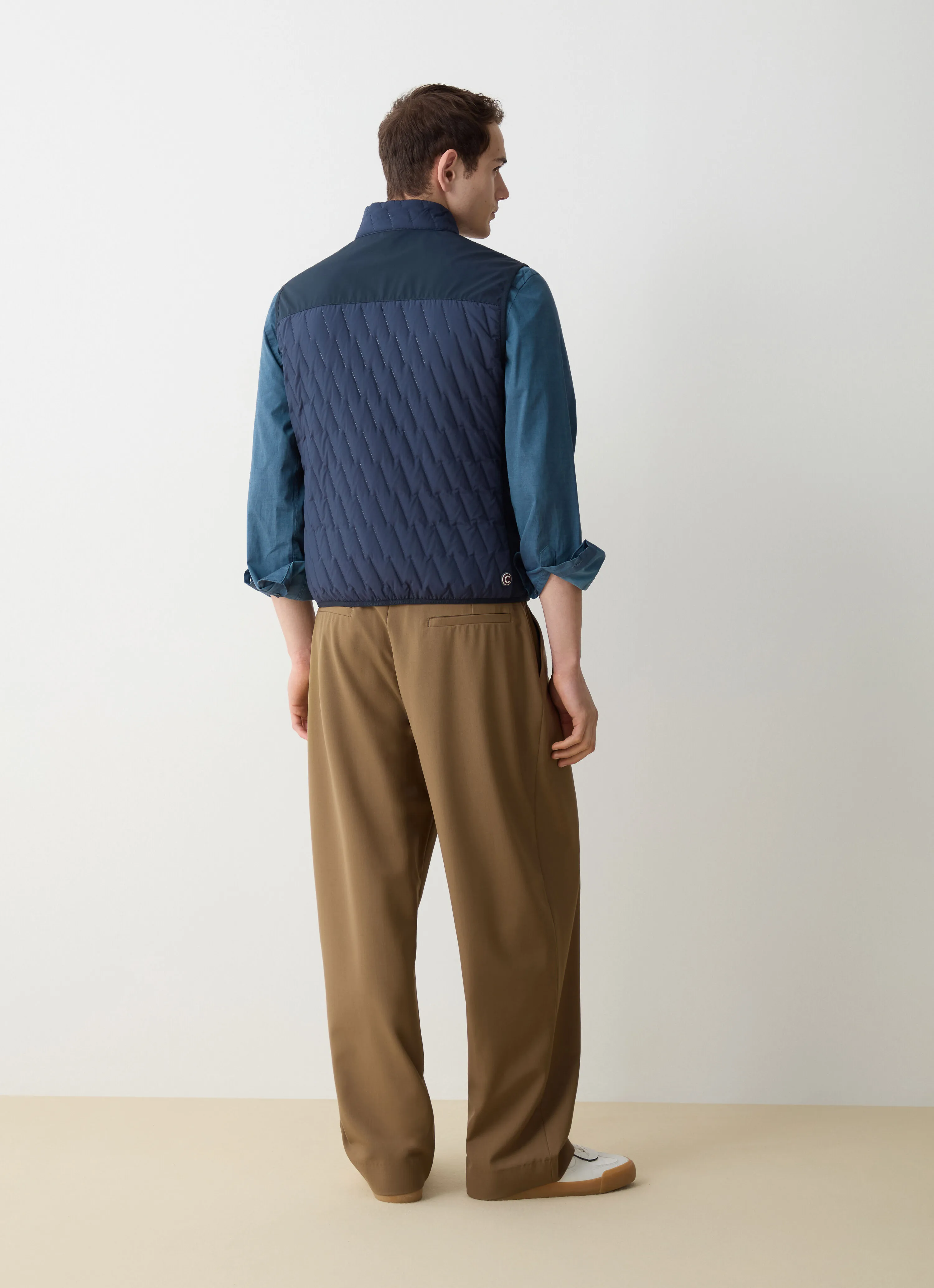 Quilted gilet with softshell inserts